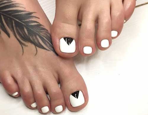 White pedicure 2020 with geometric shapes