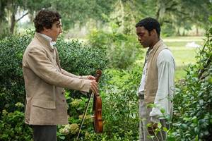 Benedict Cumberbatch and Chiwetel Ejiofor in the film 12 Years a Slave