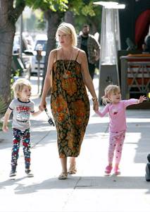 Pregnant Tori Spelling with her son and daughter