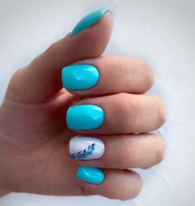Turquoise manicure with a pattern on a white background