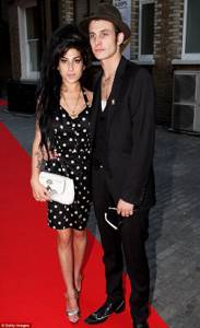 Amy WINEHOUSE with ex-husband Blake FIELD-CIVIL. It was he who got her hooked on heroin. Photo: Daily Mail. 