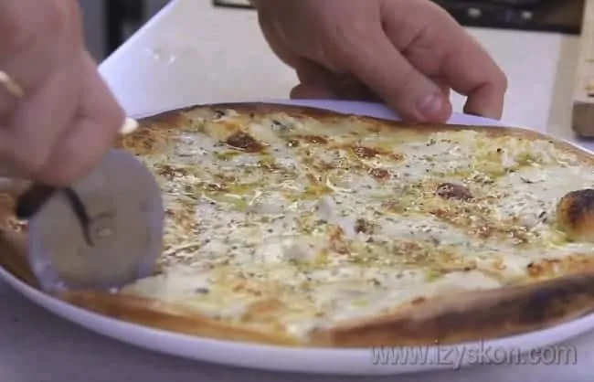 Eat the pizza hot while the cheese stretches beautifully and appetizingly.