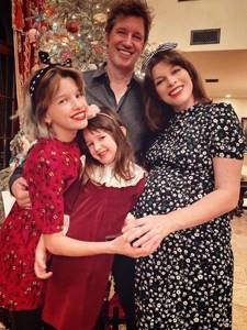 Photo of plump Milla Jovovich in the last month of pregnancy