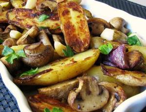 Potatoes with mushrooms in the oven