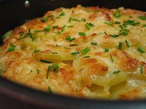 Potatoes with cheese in the oven