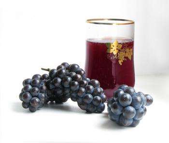 red grape juice in a glass glass