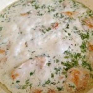 Chicken fillet in mayonnaise with garlic in a frying pan. Chicken breast in mayonnaise-garlic sauce 
