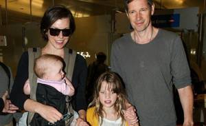 Milla Jovovich with her husband and children