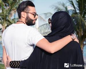 Muslim husband and wife wearing hijab