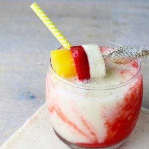 Refreshing milkshake from fermented baked milk with strawberries - recipe with photo