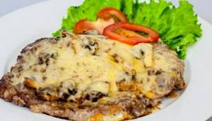 Chop with mushrooms, onions and cheese