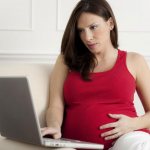 Почему у беременной болит живот