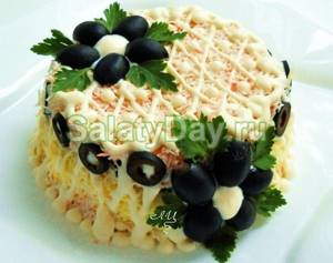 Salad with prunes and cod liver