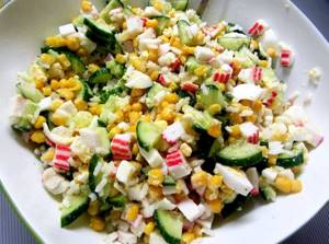 Salad with crab sticks and corn, a classic recipe with cucumber, just pour over
