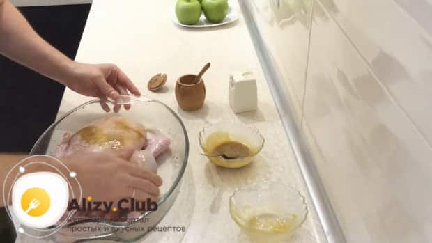 Watch how duck with apples is cooked in a duckling pan in the oven