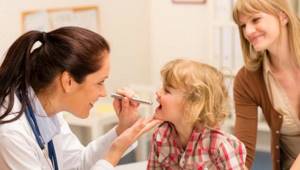 My child has a sore throat, what should I do?