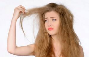 A woman&#39;s hair becomes very electrified