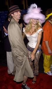 In 1999, Pamela Anderson graced the VMAs in New York wearing a bright white suit, pink fur hat and embellished pants.