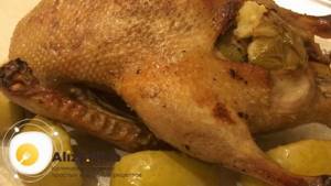 Delicious duck with apples and honey in the oven is ready