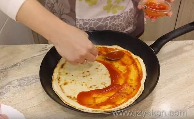 Delicious kefir pizza cooked in a frying pan