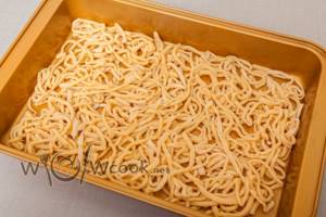 lay out homemade noodles to dry