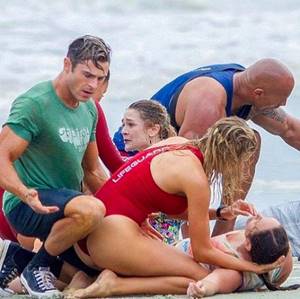 Zac Efron and Kelly Rohrbach on the set of the film &quot;Baywatch&quot;