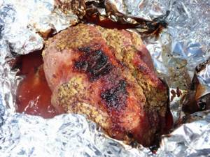 baked meat in foil photo